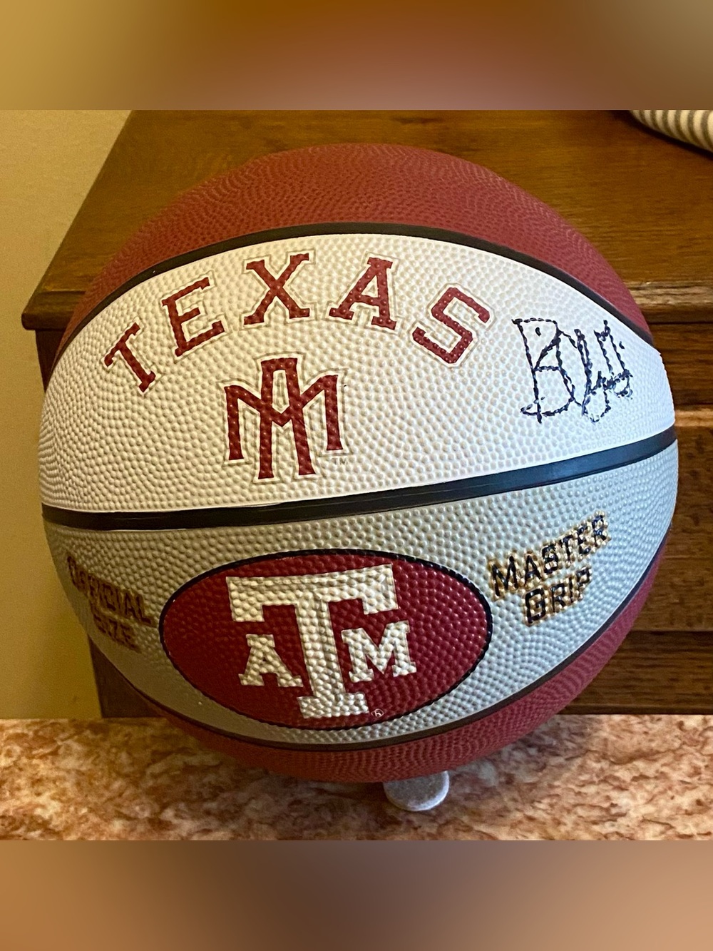 Texas A&M basketball signed by Head Coach Billy Gillespie, Coach of the year.